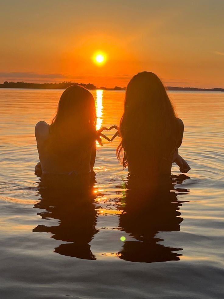two silhouettes · one heart